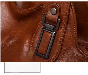 Close-up of high-quality metal buckle and leather stitching on dark brown handbag