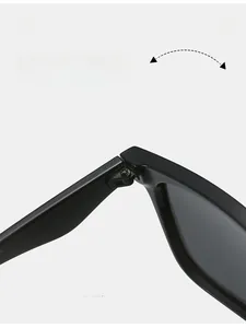 Macro shot of the durable metal hinge and sleek black frame of square polarized sunglasses