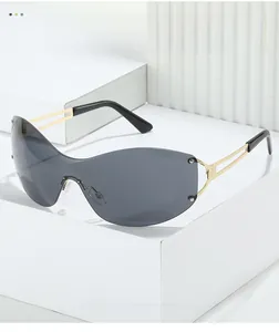 Detail of Y2K rimless sunglasses with gradient lenses and hollow metal temples