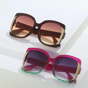 Stylish oversized women sunglasses with gradient lenses and leopard print accents