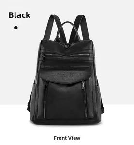 Front view of black pebble leather backpack featuring metal zippers and multiple pockets