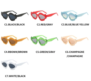 Multiple colorful wavy frame sunglasses in a flat layout showing various lens tints