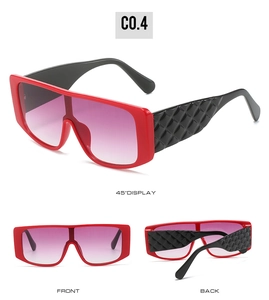 Three-view display of bright red oversized square sunglasses with black quilted temples