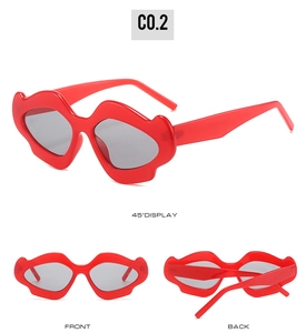 Three-angle views of red lip-shaped sunglasses showing front, back, and 45-degree angle