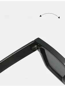 Detail of a durable metal hinge on stylish black sunglasses for long-lasting use