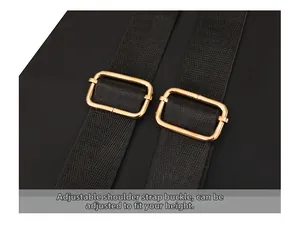 Detail of black backpack straps featuring adjustable polished gold-tone metal buckles