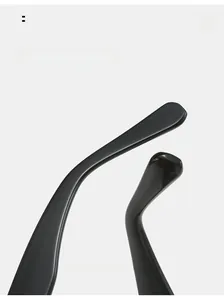 Macro detail showing ergonomic curved mirror legs of black stylish sunglasses