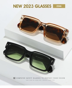 Detail of square frame sunglasses with metal rivets on stylish thick acetate frames