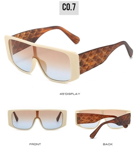 Three-way view of oversized cream sunglasses with brown tortoiseshell embossed temples