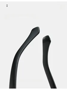Detail of curved ergonomic black mirror legs on modern triangle butterfly sunglasses
