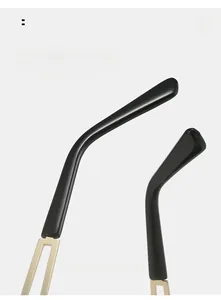 Detail view of ergonomic curved glasses legs with black acetate and gold metal finish