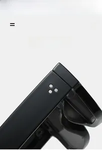 Close-up of flexible black rectangular frame with three silver metal rivet hinges