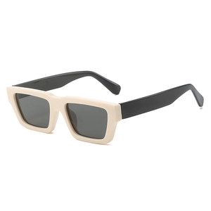 Retro cream rectangle sunglasses with chunky beige frames and dark lenses for street style