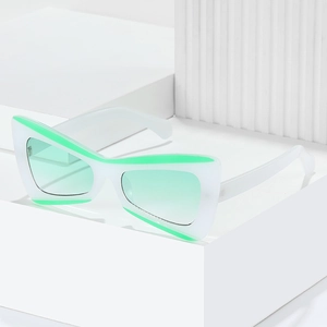 Fashionable butterfly PC sunglasses for women with white frame and neon green accents