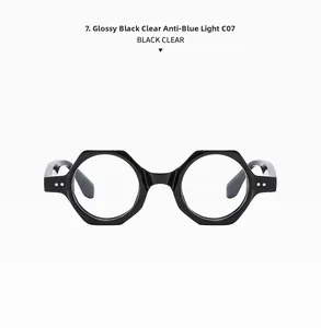Detailed close-up of glossy black polygonal frames with clear blue light blocking lenses