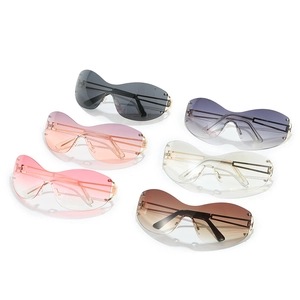 Y2K frameless oversized sunglasses set featuring six gradient lenses and golden metal temples