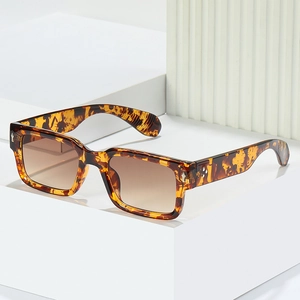 Retro rectangle sunglasses with thick leopard print frames and brown gradient lenses