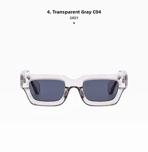 Detailed view of square transparent grey sunglasses with high-quality metal hinges
