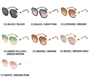 Collection of seven polygon sunglasses in various gradient lens colors and metal frames