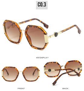 Multiple views of oversized hexagonal tortoiseshell sunglasses with gold metal accents
