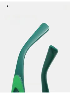 Close-up of vibrant green curved mirror legs on trendy small frame sunglasses