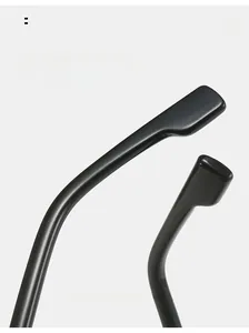 Macro view of ergonomic curved glossy black sunglass legs for comfortable wear