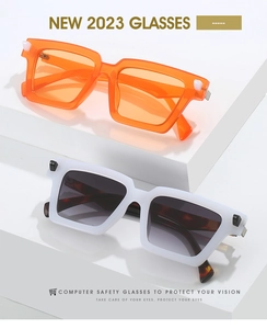 Close-up of stylish square sunglasses with tortoiseshell temples and spring hinges