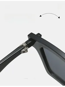 Macro shot of durable silver metal hinge on luxury black frame sunglasses for women