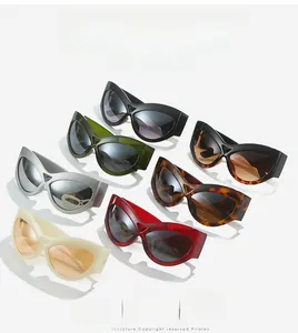 Array of colorful oversized cat-eye sunglasses with UV400 protection frames