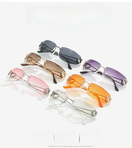 Lunettes de soleil sans monture avec charnières en cœur et verres colorés Y2K