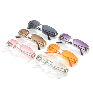 Lunettes de soleil sans monture pour femme avec charnière coeur en six coloris mode