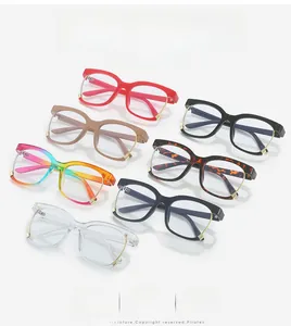 Flat lay of colorful oversized eyewear frames in seven different stylish colors and finishes