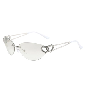 Frameless cat-eye sunglasses with heart-shaped metal hinges and silver temples