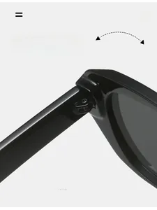 Close-up of durable metal hinge on black square sunglasses with reinforced structure