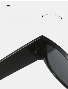 Detail of durable reinforced metal hinge construction on black thick frame sunglasses
