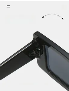 Macro detail of a durable black resin hinge on oversized wraparound sunglasses