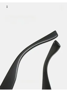 Detail of curved black glossy temple legs for comfortable wear on oversized sunglasses