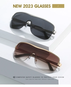 Detail of half-frame computer safety glasses with metal temples and silicone nose pads