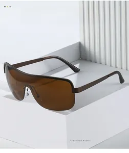 Close-up of modern semi-rimless sunglasses with deep brown lenses on a white geometric stand