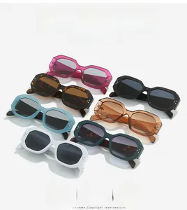 Detailed overhead view of multi-color geometric sunglasses with chic rivet accents