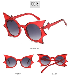 Three views of red butterfly sunglasses with grey gradient lenses and unique frame