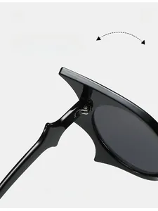 Macro shot of durable metal hinge on black butterfly sunglasses with seamless folding