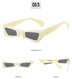 Multiple views of unique butterfly tooth sunglasses in cream white with grey lenses