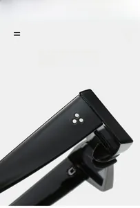 Close-up of black sunglasses hinge with triple silver rivets on a high-elasticity frame