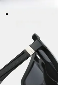 Detail of the high-elasticity hinge and metal hardware on these square sports sunglasses