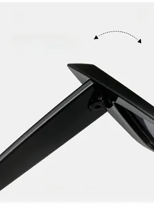 Close-up of durable metal hinge on black polished butterfly sunglasses frame