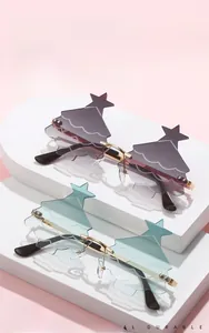 Detail of rimless Christmas tree sunglasses with star accents and gold metal temples