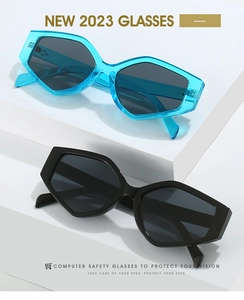 Detail of geometric polygon frames in transparent blue and black for eye protection
