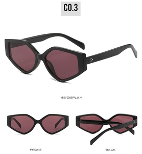 Detailed views showing the geometric triangle frame sunglasses with dark red lenses