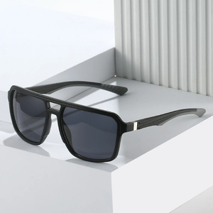 Minimalist double-bridge square sunglasses with black matte frame and dark lenses